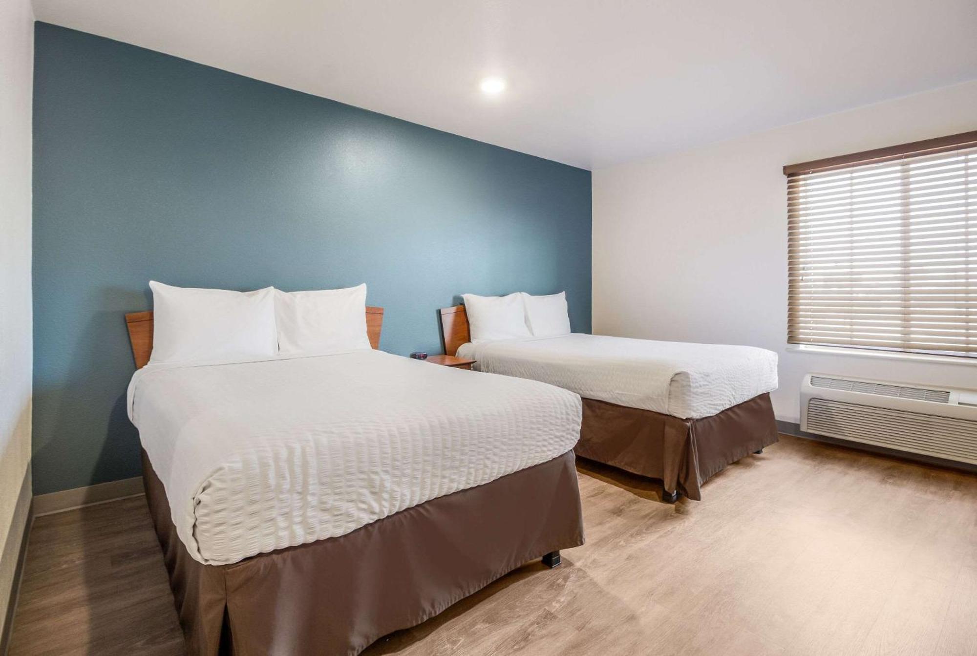 Woodspring Suites Houston Бейтаун Номер фото